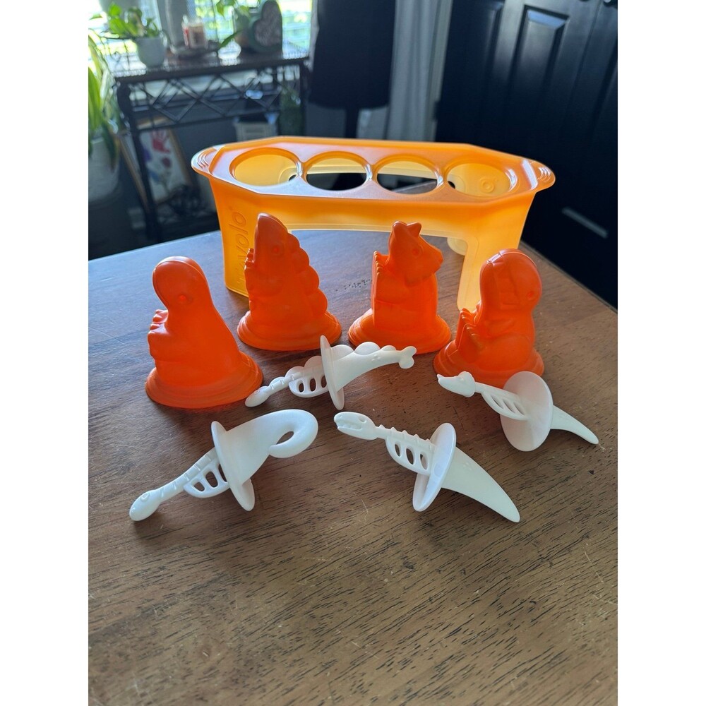 Tovolo Dino Pop Molds, a set of four dinosaur-shaped silicone popsicle maker